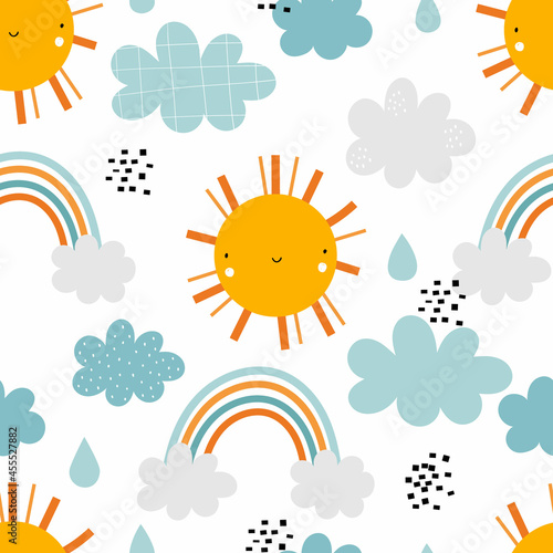 Vector hand-drawn seamless childlish pattern with cute sun, clouds, drops and rainbows on a white background. Kids texture for fabric, wrapping, textile, wallpaper. Trendy scandinavian print. © ZHUKO