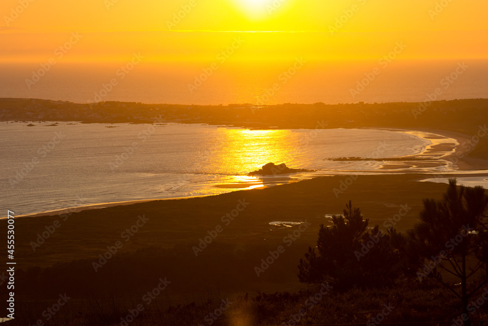 Fototapeta premium Sunset at the mouth of a river