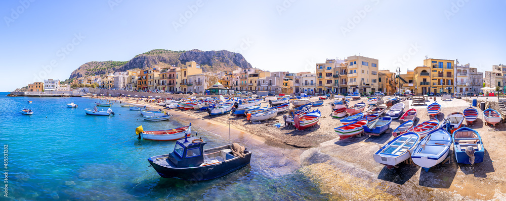 colorful fishing boats at the port of aspra, sicily