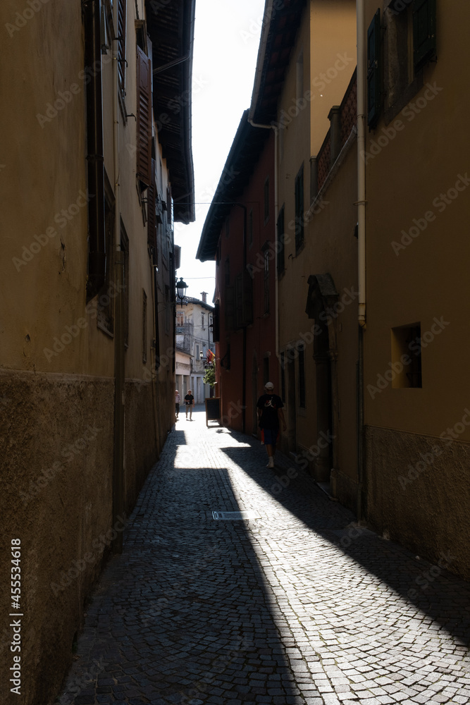 Cividale del Friuli (Udine), Italy - September 5, 2021: North Italy Life in the center of the lombard medieval city. Walking through narrow streets and walls. Sunny summer day. Selective focus
