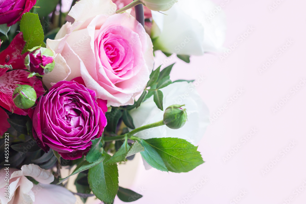 Beautiful modern bouquet of roses, eustoma, freesia close-up