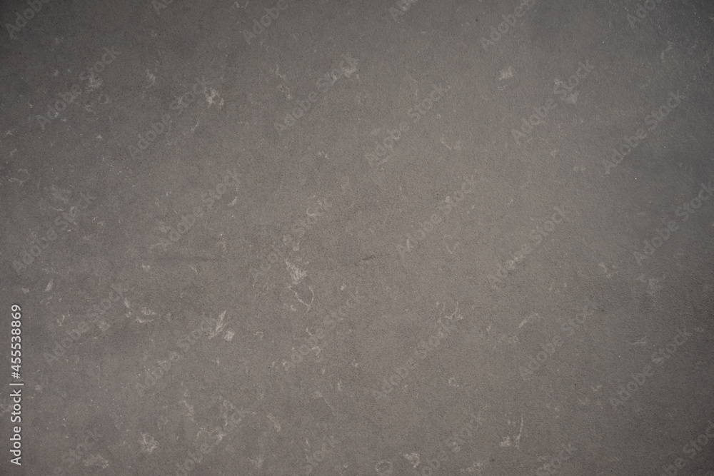 Obraz premium Flatlay of granite black stone surface for product and package background advertisment.