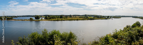 Panorama view on a beautiful summer day from the river called "the Maas" in the province of Limburg, the rain river feared for the danger of flooding during heavy rainfall