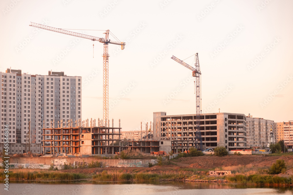 Kazan, Russia - June 8, 2021: .Construction crane and a building house