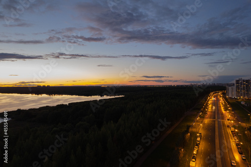 avenue park view of the skyscraper in the evening sunset lakhta center photo