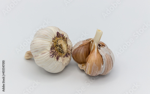 Ripe garlic  dried garlic on a white background