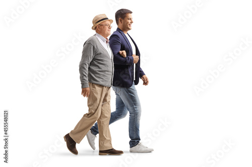Son and elderly father walking