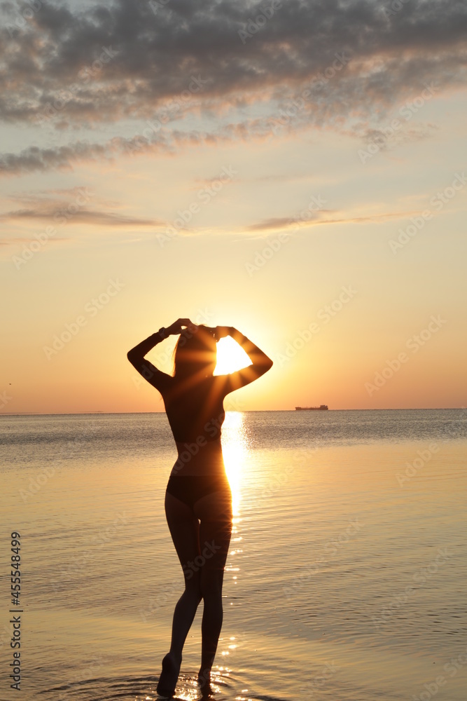 silhouette of a person on a beach