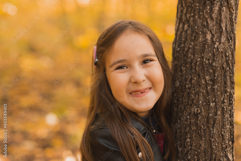 Autumn portrait of cute little asian girl. Children, fall and season concept. Autumn portrait of cute little asian girl. Children, fall and season concept.