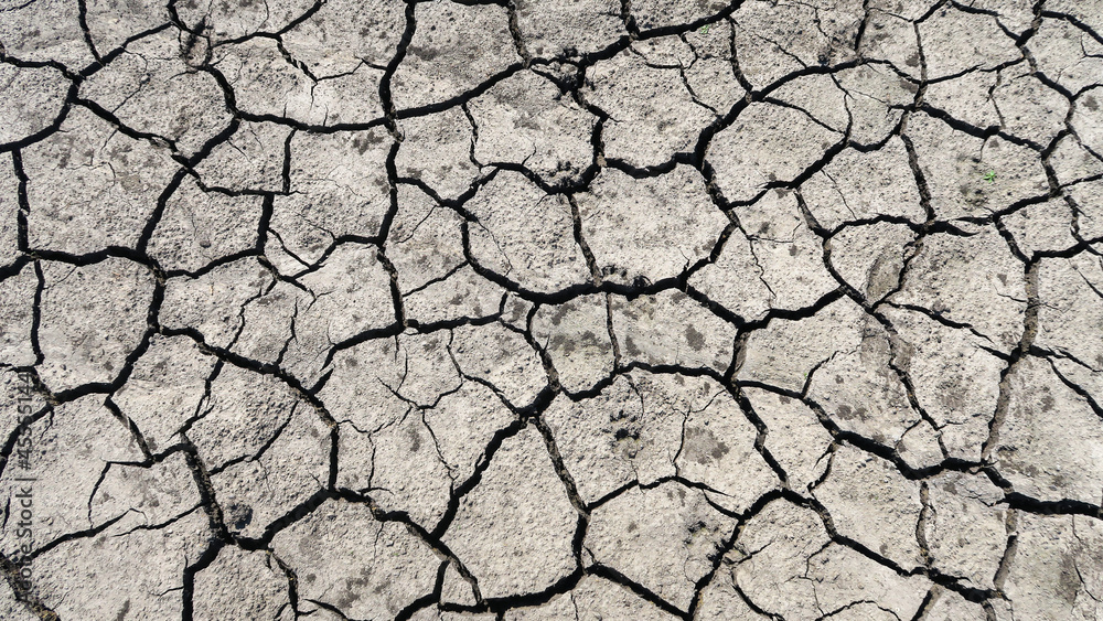 Cracked earth in a severe drought. The unbearable heat. Cracked earth in a severe drought. The unbearable heat.