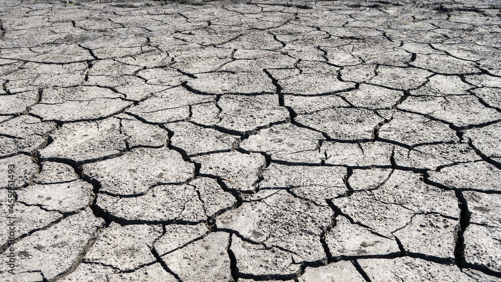 Cracked earth in a severe drought. The unbearable heat. Cracked earth in a severe drought. The unbearable heat.