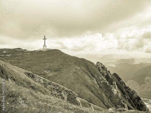 View with the Heroes Cross on Caraiman peak, in Bucegi Mountains Romania.