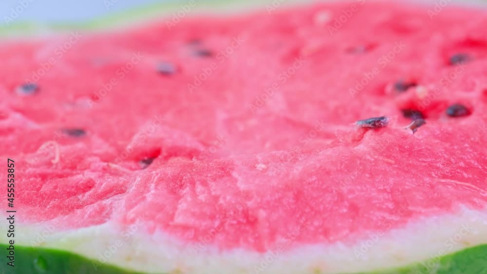 The cut watermelon rotates around the axis
The cut watermelon rotates around the axis