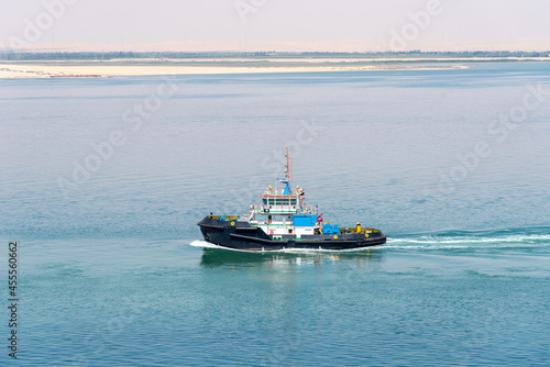 Tug boat sailing through Grate Bitter Lake. She assists to the cargo ships transiting Suez Canal.  © Mariusz