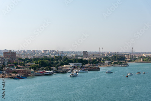 An Egyptian maritime port at the city of Tawfiq (Suburb of Suez), on the southern end of the Suez Canal before exiting into the Red Sea.  © Mariusz