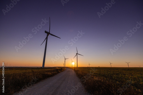 Wind Turbines producing energy at sunset