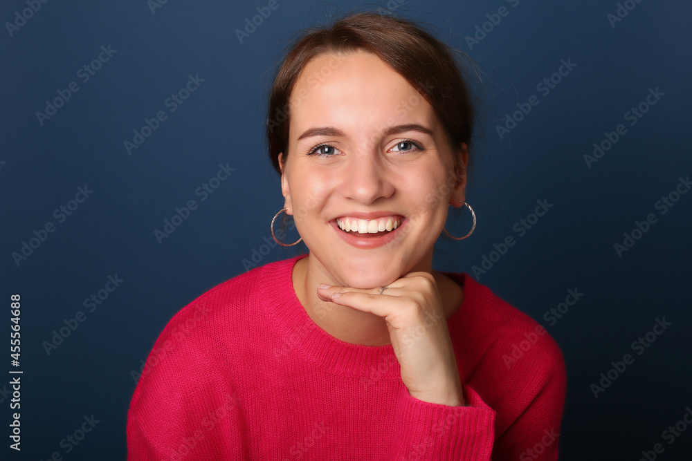 Beautiful woman in front of a background Beautiful woman in front of a background