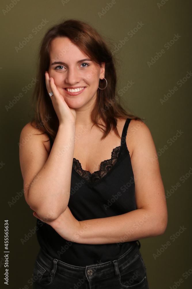 Beautiful woman in front of a background Beautiful woman in front of a background