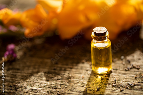 oil with herbs. Oil herb. Flowers. Background. 