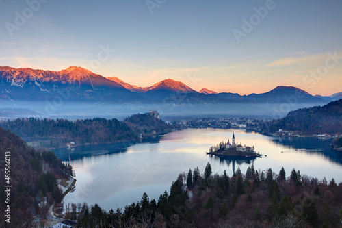 Elevated view of Lake Bled and the Church of Mary the Queen, located on a small island in the middle of the lake, Bled, Slovenia
