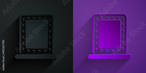 Paper cut Makeup mirror with lights icon isolated on black on purple background. Paper art style. Vector