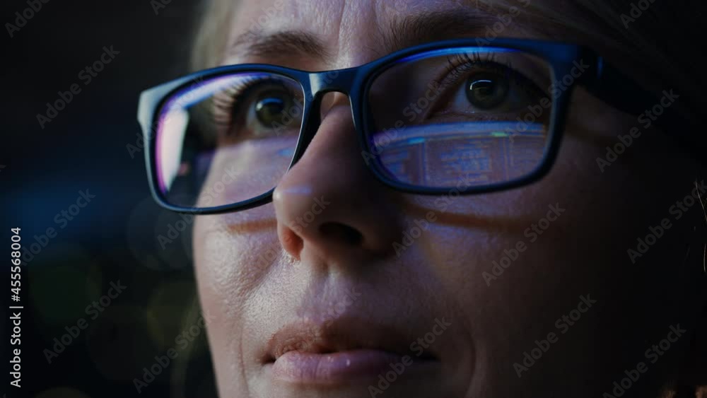 Close-up Portrait of Female Software Engineer Working on Computer, Programming Reflecting in Glasses. Developer Working on Innovative e-Commerce Application using Machine Learning, AI, Big Data Close-up Portrait of Female Software Engineer Working on Computer, Programming Reflecting in Glasses. Developer Working on Innovative e-Commerce Application using Machine Learning, AI, Big Data