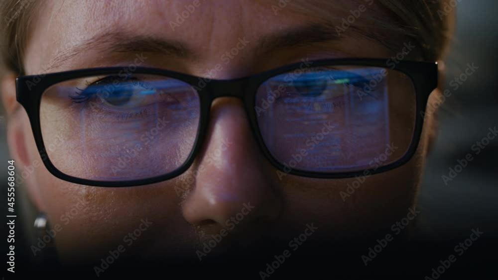 Close-up Portrait of Female Software Engineer Working on Computer, Programming Reflecting in Glasses. Developer Working on Innovative e-Commerce Application using Machine Learning, AI, Big Data Close-up Portrait of Female Software Engineer Working on Computer, Programming Reflecting in Glasses. Developer Working on Innovative e-Commerce Application using Machine Learning, AI, Big Data