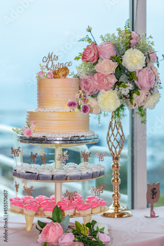 Qunceañera Cake and  bouquet 