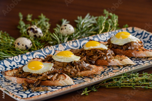 Fried Quail Eggs over Hen-of-the-Woods Mushrooms on Toast