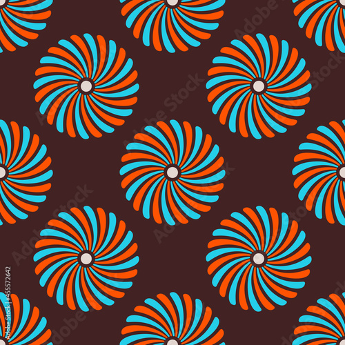 Seamless african fashion vector pattern with circles. Swirling geometric shapes. Bright, vibrant colors. Color illustration.