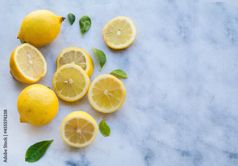 Fresh Lemons on White Marble Background with Copy Space. Top View. Fresh Lemons on White Marble Background with Copy Space. Top View.