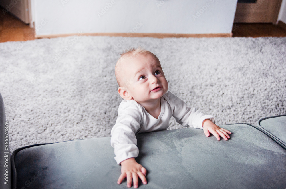 Naklejka premium portrait of a beautiful emotional baby with big beautiful eyes 