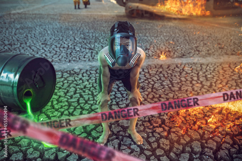 Illustration of man wearing has mask on fire ground and chemical container photo