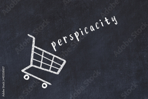 Chalk drawing of shopping cart and word perspicacity on black chalboard. Concept of globalization and mass consuming photo