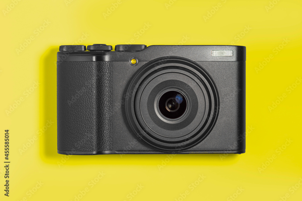 Digital camera on bright background