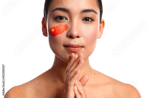 Young woman with flag of Ch...