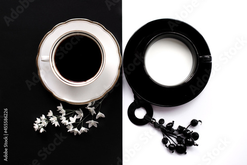 Two cups of coffee representing Yin-Yang photo