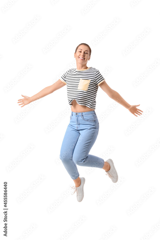 Jumping young woman on white background