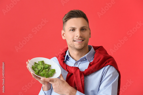 Handsome young man with pla...