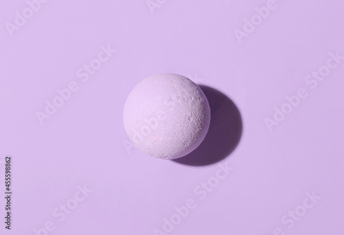 Lavender bath bomb on color background