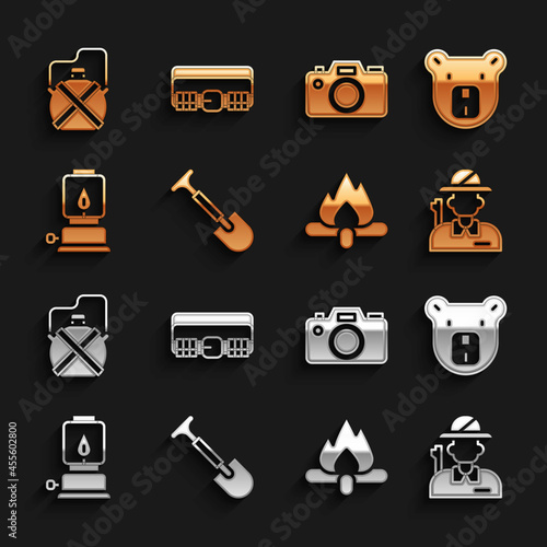 Set Shovel, Bear head, Hunter, Campfire, Camping lantern, Photo camera, Canteen water bottle and Hunting cartridge belt icon. Vector