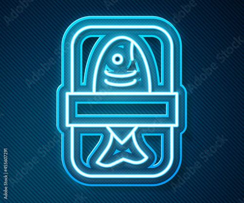 Glowing neon line Fish plastic tray container with cellophane cover icon isolated on blue background. Vector