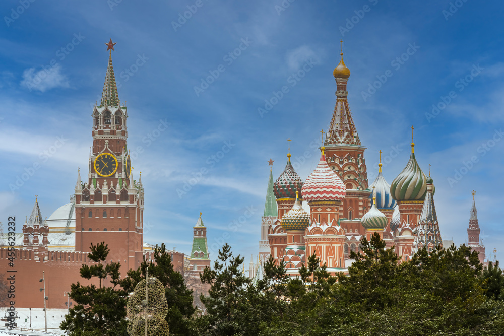 Intercession Cathedral or St. Basil's Cathedral and the Spassky Tower of Moscow Kremlin at Red Square in Moscow, Russia