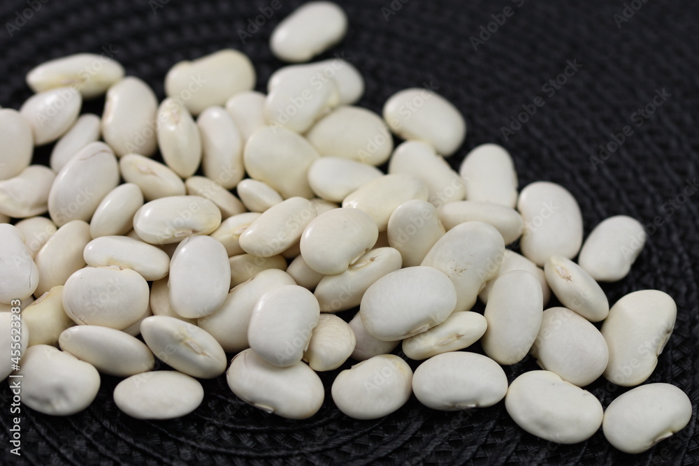 white beans pile on black
