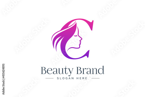 Letter C beauty logo design. Woman face silhouette isolated on letter C