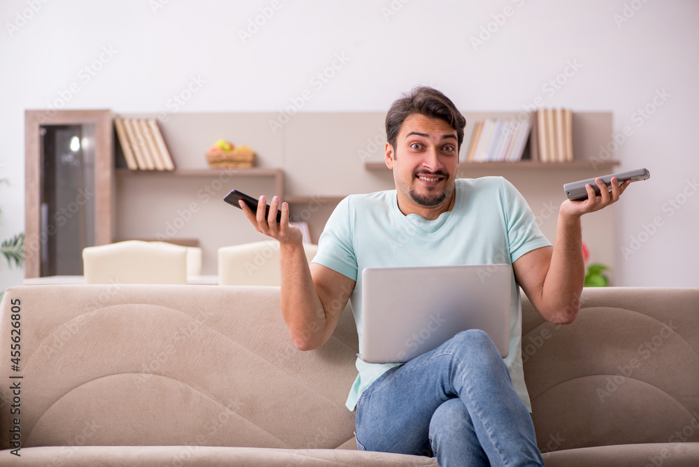 Young male freelancer working from home Young male freelancer working from home