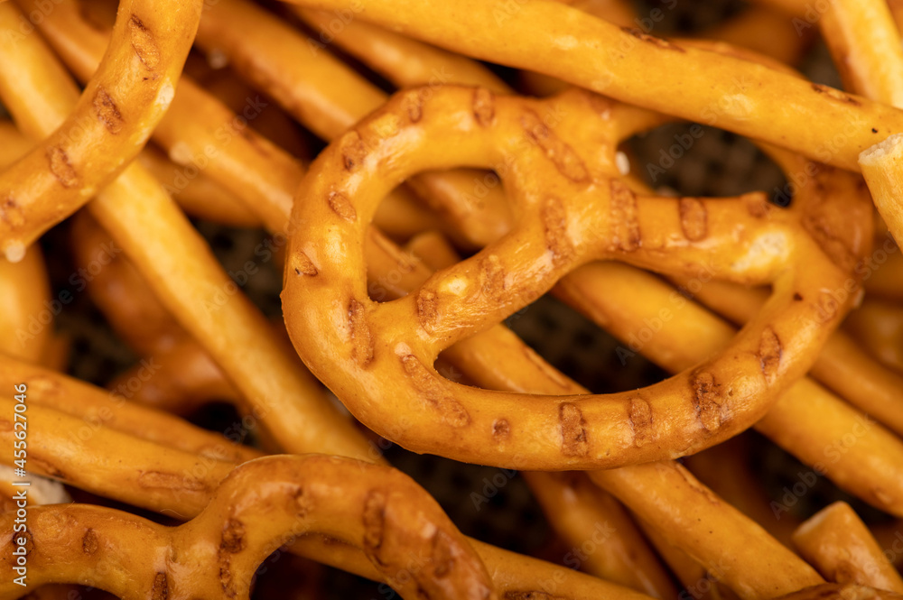 Crispy bread straws with salt, close-up, selective focus, top view. Crispy bread straws with salt, close-up, selective focus, top view.