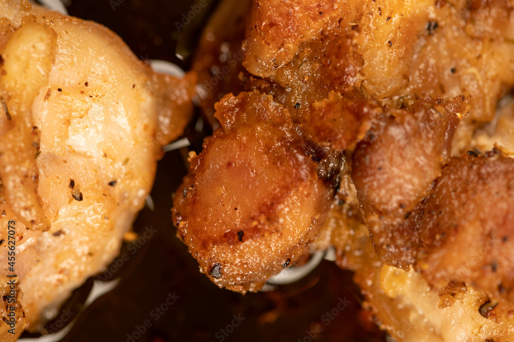 Fried pieces of meat in a frying pan, close-up, selective focus. Fried pieces of meat in a frying pan, close-up, selective focus.