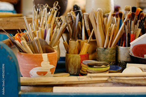 brushes paint and pottery