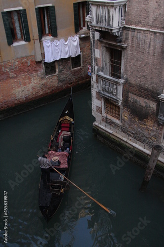 Venice, Italy People enjoying a ride in a gondola in Venice. © Cristina
